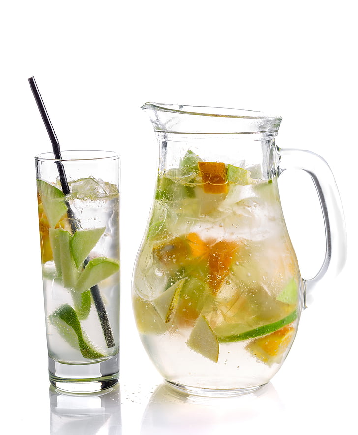 clear glass pitcher and glass cup filled with sliced fruits