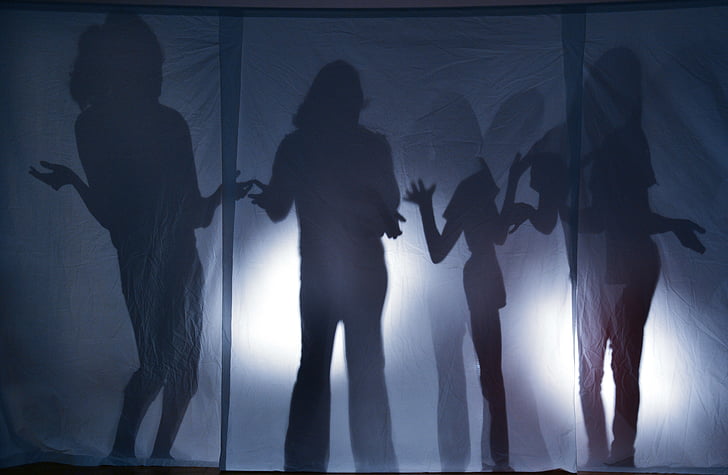 four silhouette of persons
