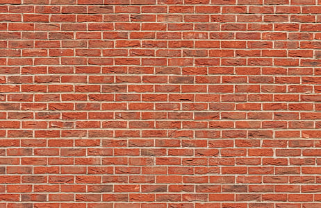photo of brown concrete brick wall