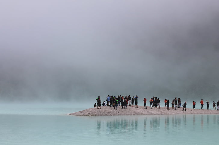 group of people near bodies of water