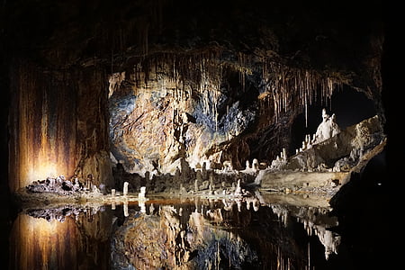 landscape photography of cave with stalagmites