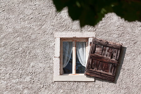 white wooden framed glass window at daytime