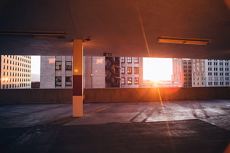 white concrete building during sunset