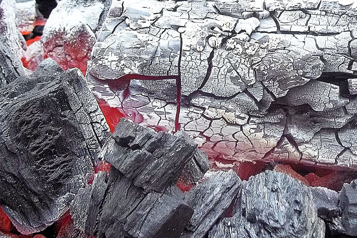firewood coals turning to ashes close up photography