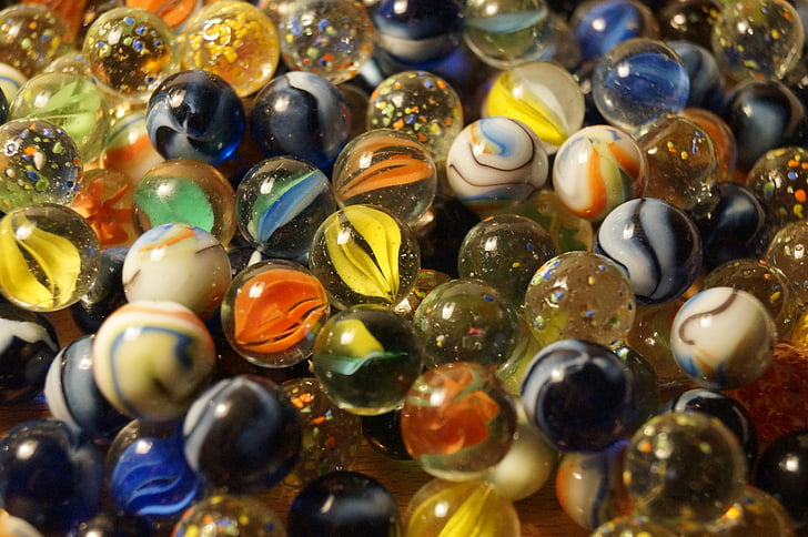 close-up photography of marble balls