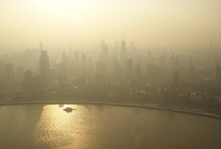 aerial photo of city skylines during foggy day