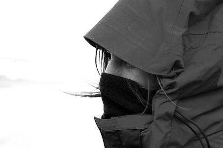 woman in hoodie and balaclava greyscale photography