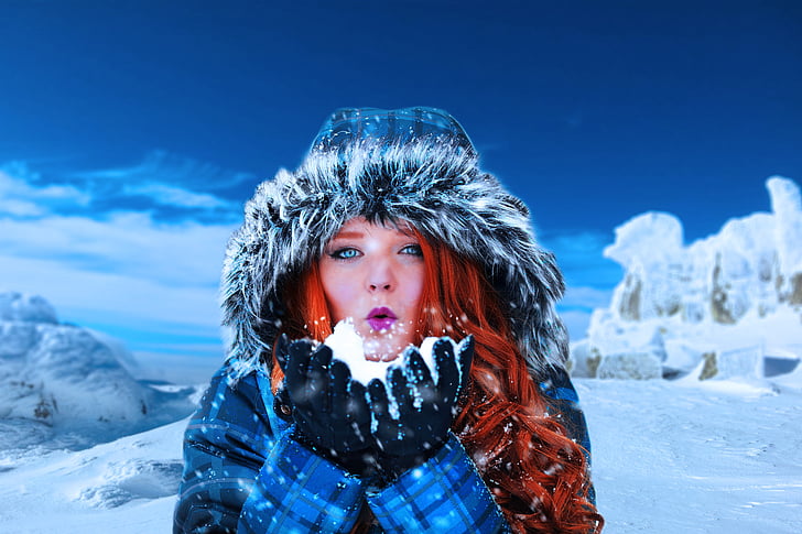 Full body portrait of young woman walking in snowy winter park wearing blue  coat, knitted warm clothes. Female fashion for cold weather Stock Photo -  Alamy