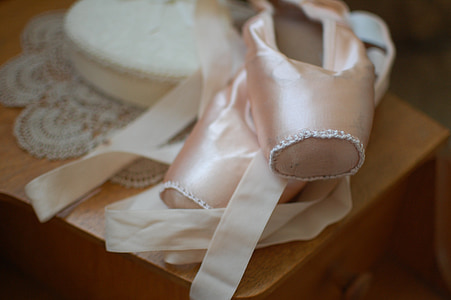 pink ballerina shoes with white lace