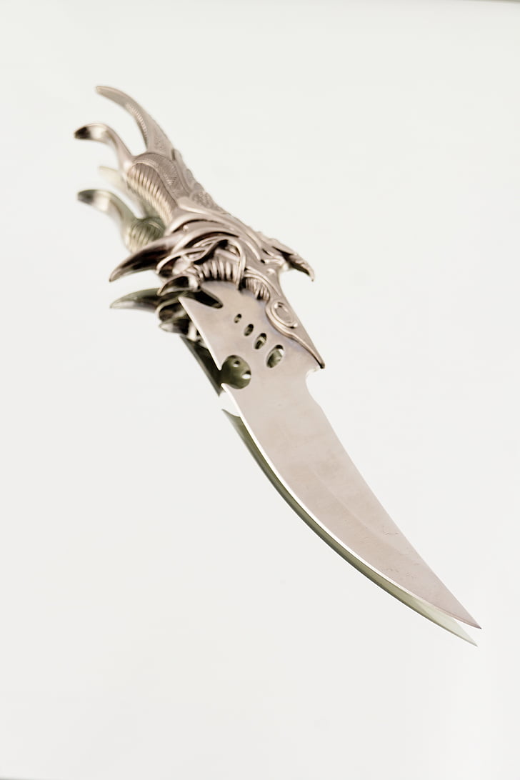 silver-colored dagger