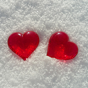 two heart-shaped accessories