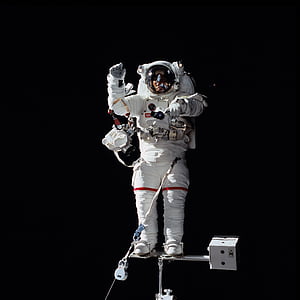 man in white astronaut suit