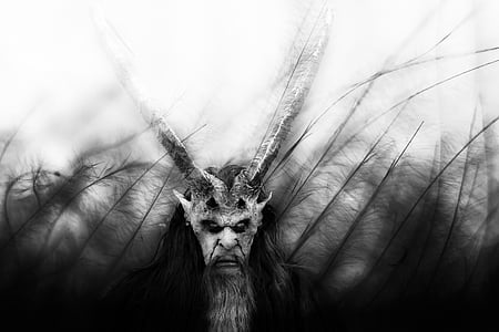 grayscale photo of demon
