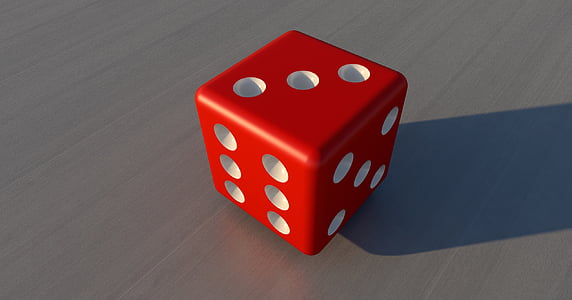 red dice displaying 3