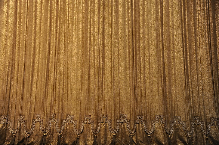 closeup photo of brown curtain