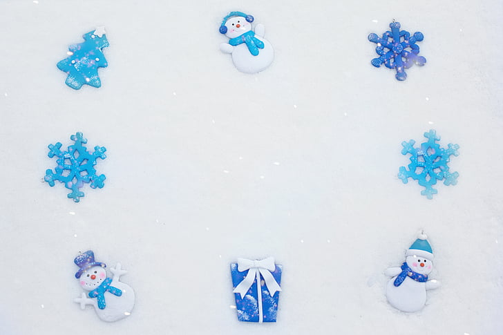 eight blue and white snowflakes and snowman Christmas decor