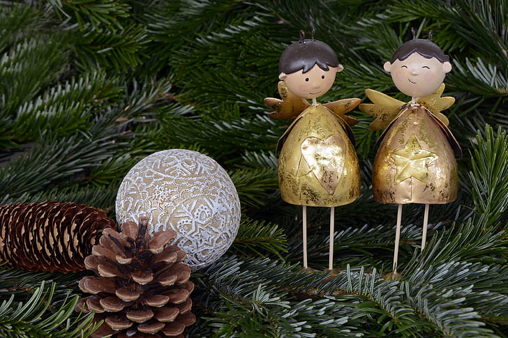 two gold Christmas decorations