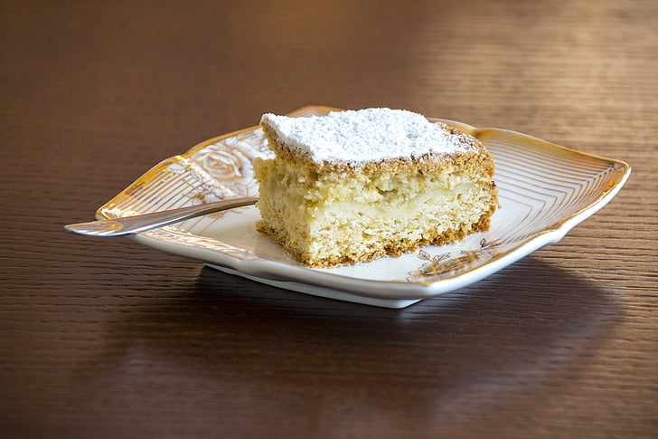 slice of cake on white ceramic plate
