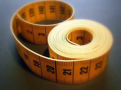 yellow and black tape measure