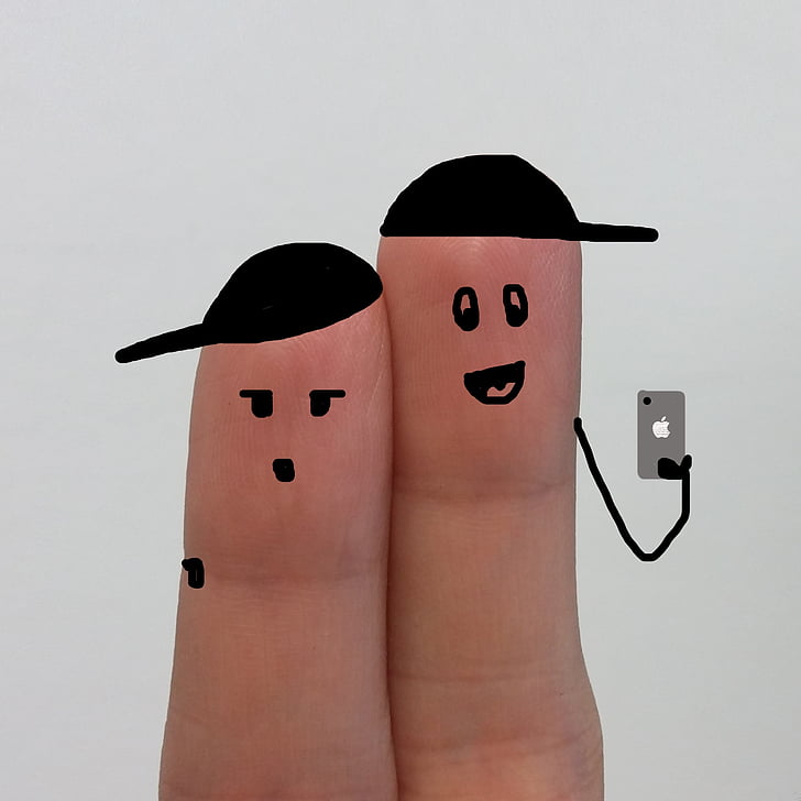 two person's fingers