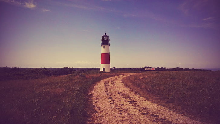 photo of lighthouse near pathway