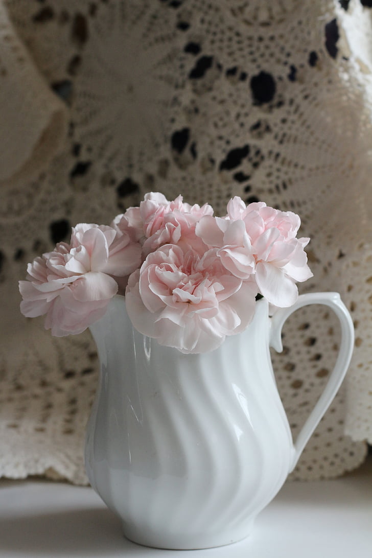 pink petaled artificial flower centerpiece