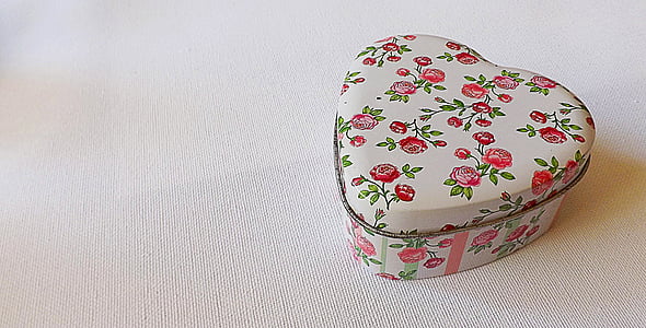 heart red and white floral tin can close up photo