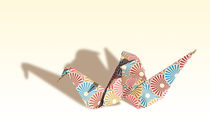 multicolored origami swan