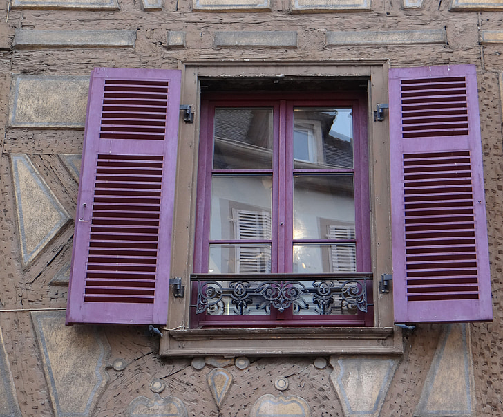 purple wooden window open