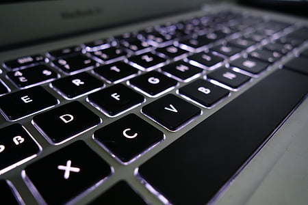 close-up photo of silver MacBook Air