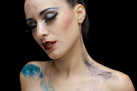 woman with glitter and black eyeshadow