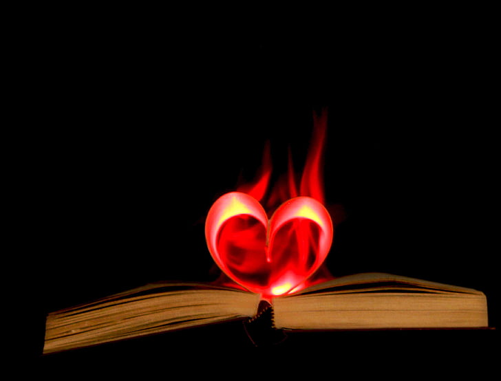 heart 3D LED lamp on book page