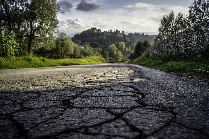 gray asphalt road with crack