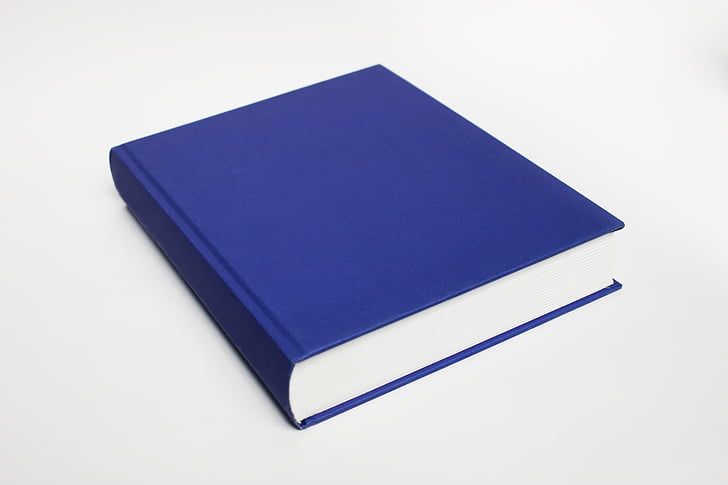blue soft-bound book