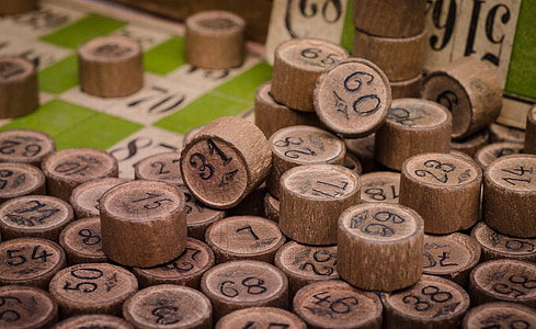 close-up photo of round brown board game pieces