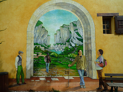 group of people standing in front of archway painting
