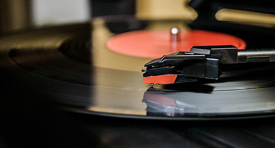 closeup photo of turntable with vinyl record