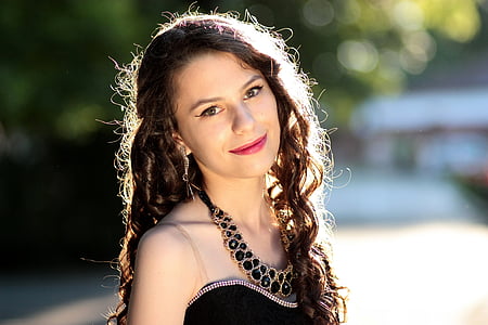 woman wearing black strapless top