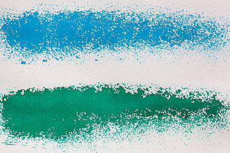 white, blue, and green spray background