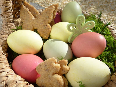 assorted-color egg on brown wicker basket