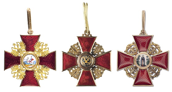 three red ankh cross pendants