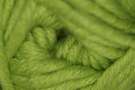 macro photo of green yarn