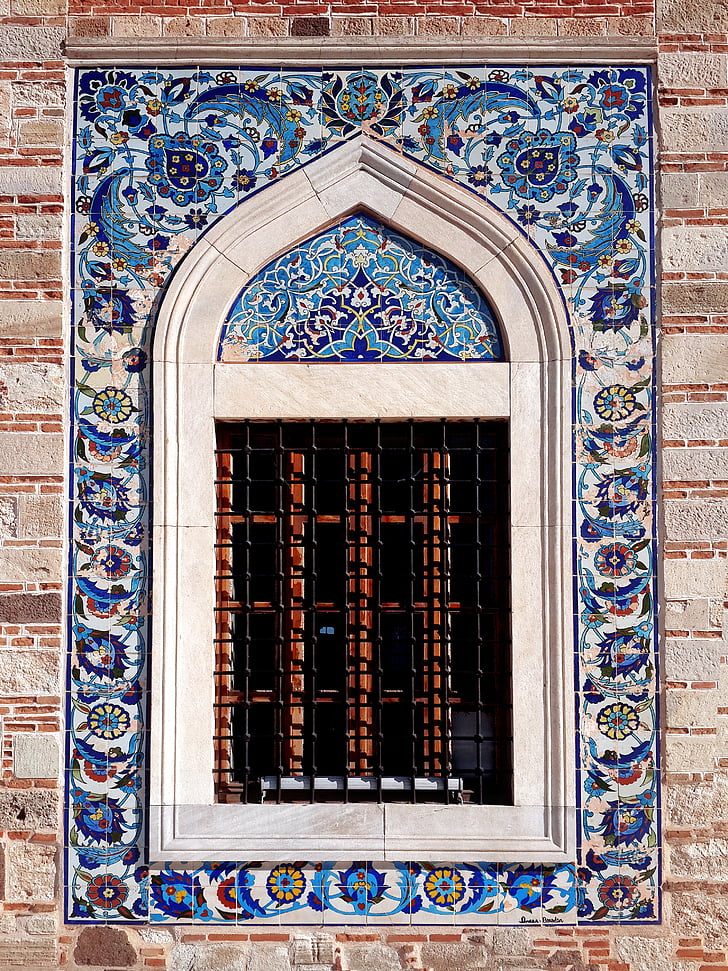 window with blue floral wall tile