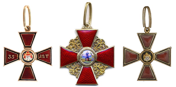 three red cross pendants