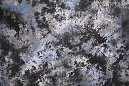 gray, white, black, and blue textile