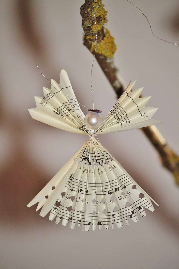 selective-focus photograph of paper angel ornament