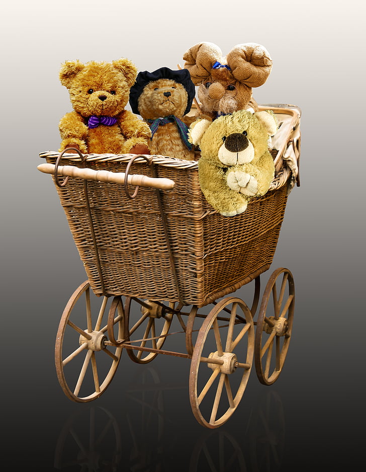 four bear plush toys in brown wicker pram stroller