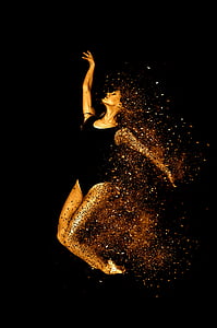 woman in black leotard dancing rising right hand