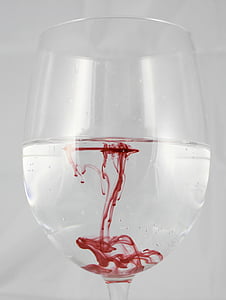 goblet glass with red liquid