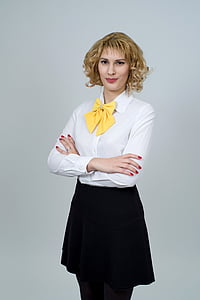 woman in white dress shirt with black skirt